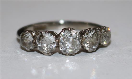 A 1940s/1950s 18ct white gold and graduated five stone diamond ring, size J.